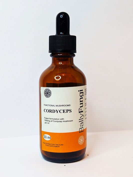 Cordyceps Dual Extract Tincture – A premium 50ml bottle of dual-extracted liquid Cordyceps for energy and endurance support. Placed on a clean, earthy background with fresh Cordyceps mushrooms, symbolizing vitality, stamina, and performance.